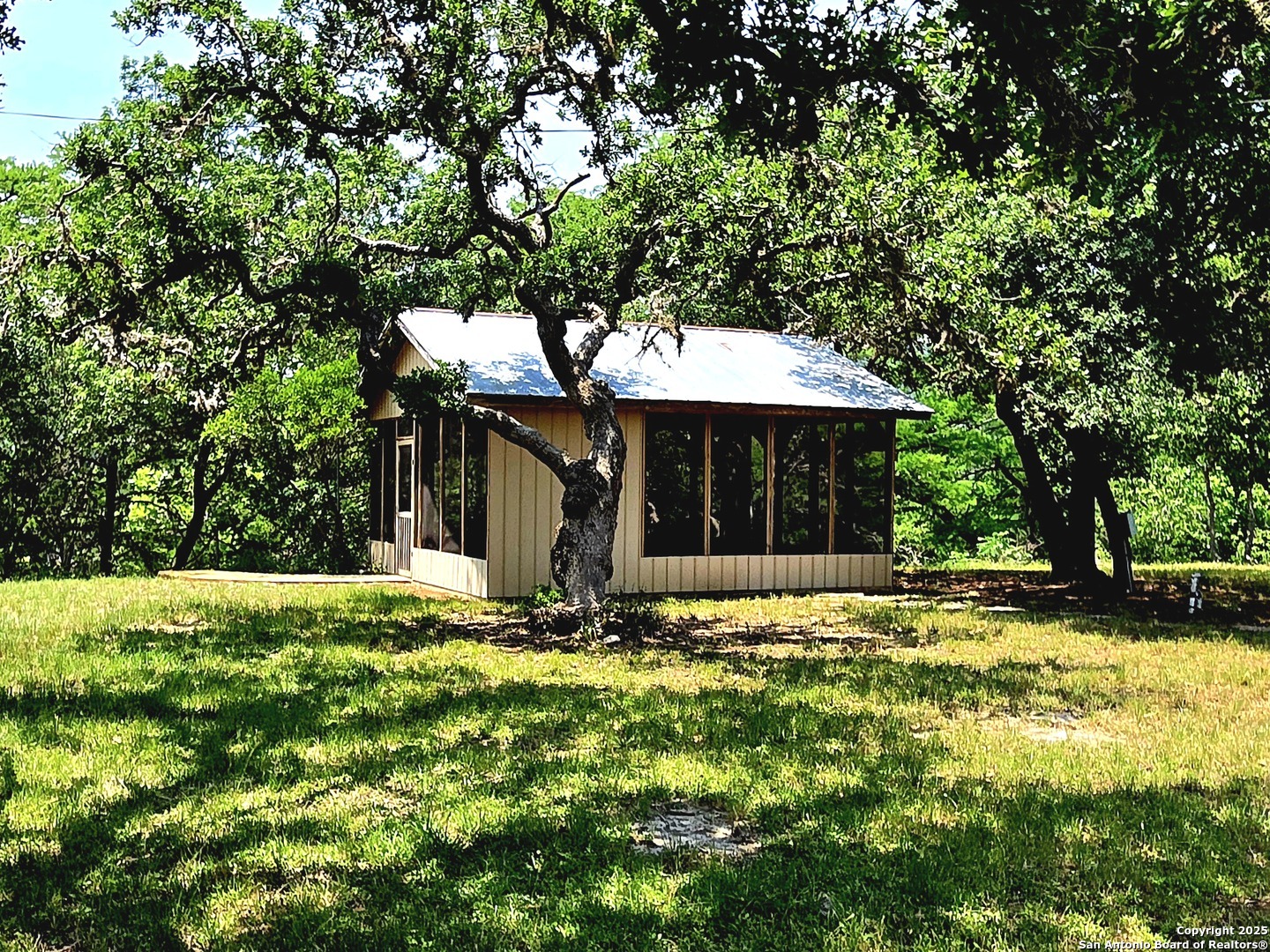 230 Rocky Top Road Medina, TX 78055 - Photo 25 of 37 a front view of a house with a yard