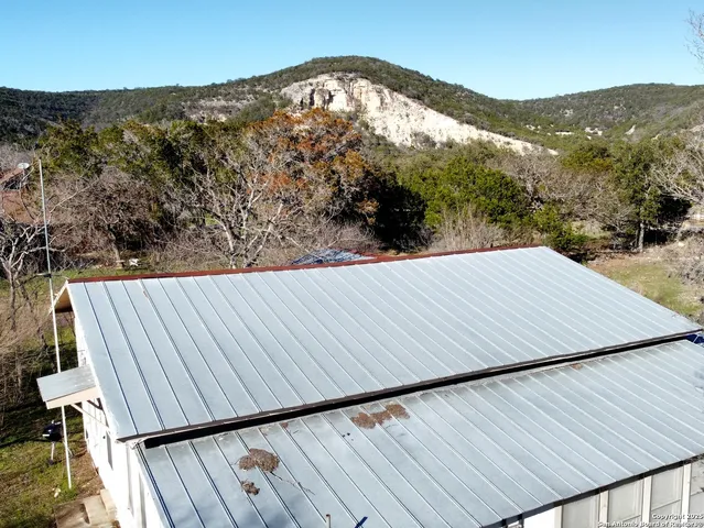 a view of a backyard of a house