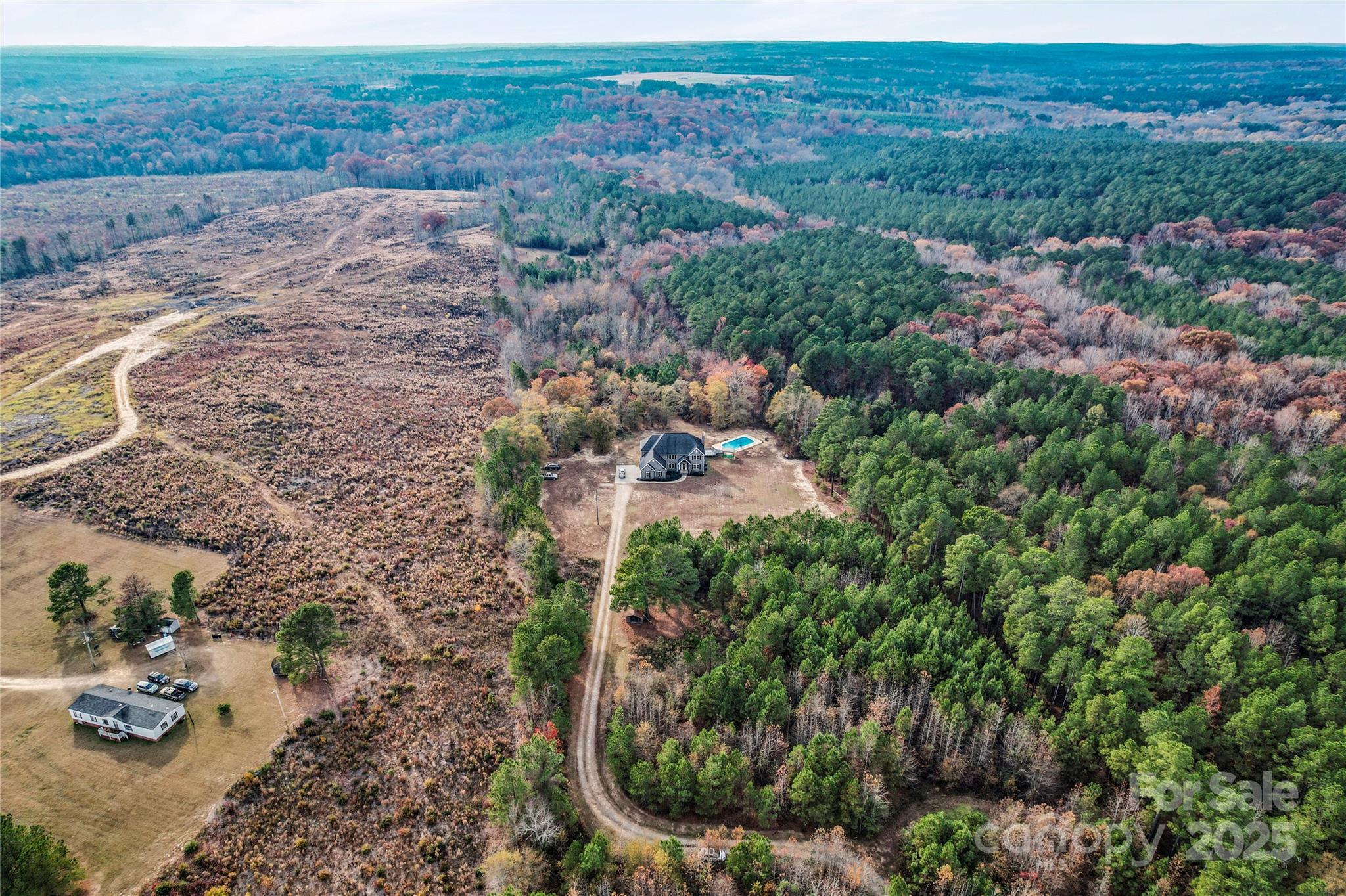 1556 Diggs Road Wadesboro, NC 28170 - Photo 3 of 48 an aerial view of multiple house