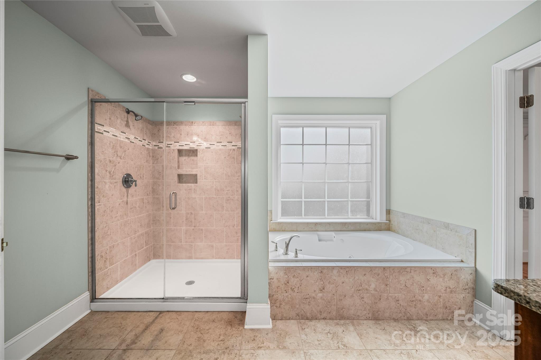 1556 Diggs Road Wadesboro, NC 28170 - Photo 39 of 48 a bathroom with a glass shower door