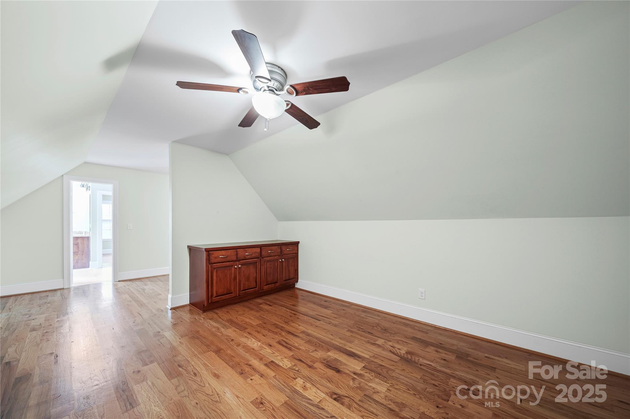 1556 Diggs Road Wadesboro, NC 28170 - Photo 40 of 48 a view of an empty room and wooden floor