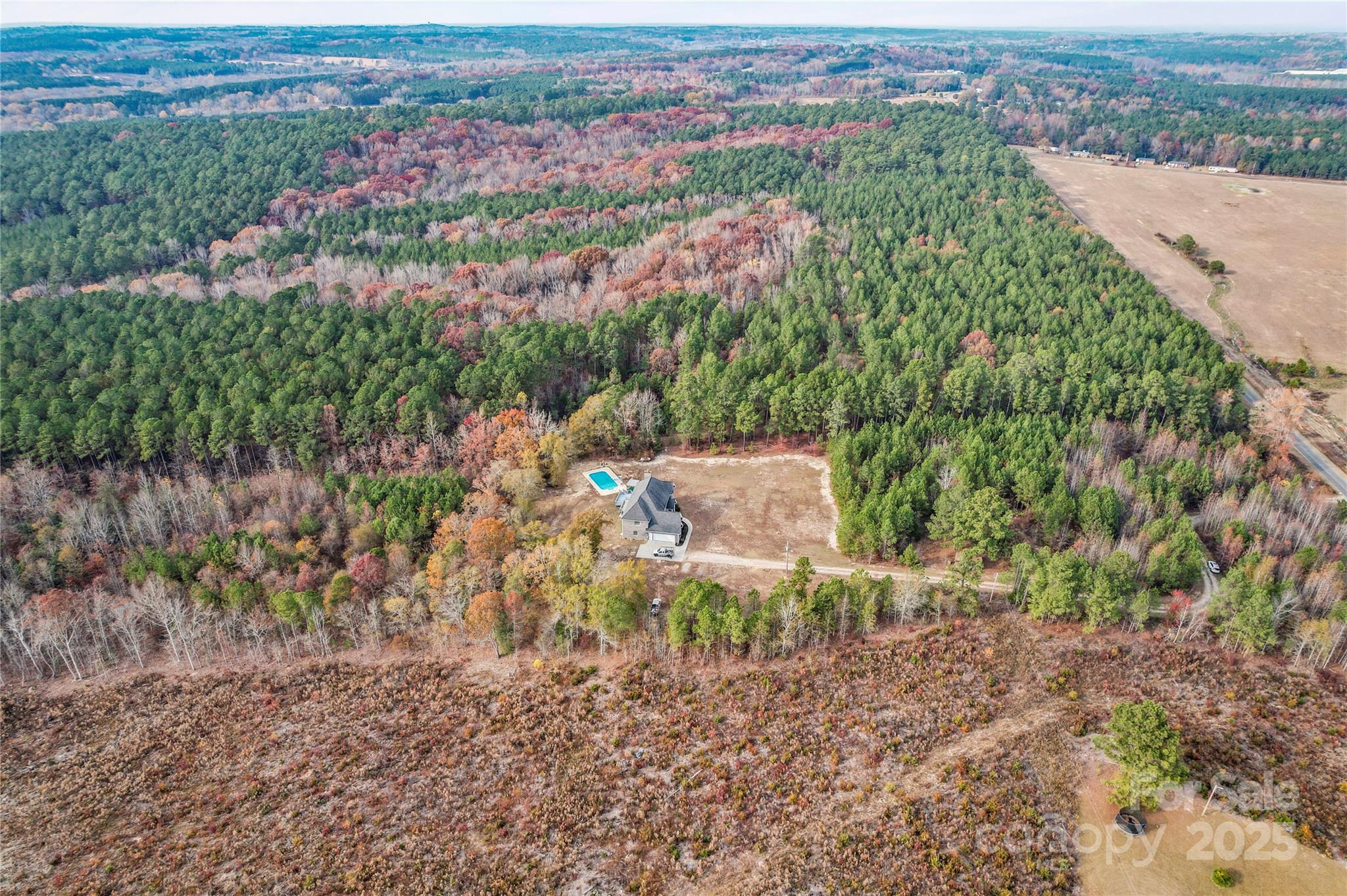 1556 Diggs Road Wadesboro, NC 28170 - Photo 5 of 48 an aerial view of a house with a yard