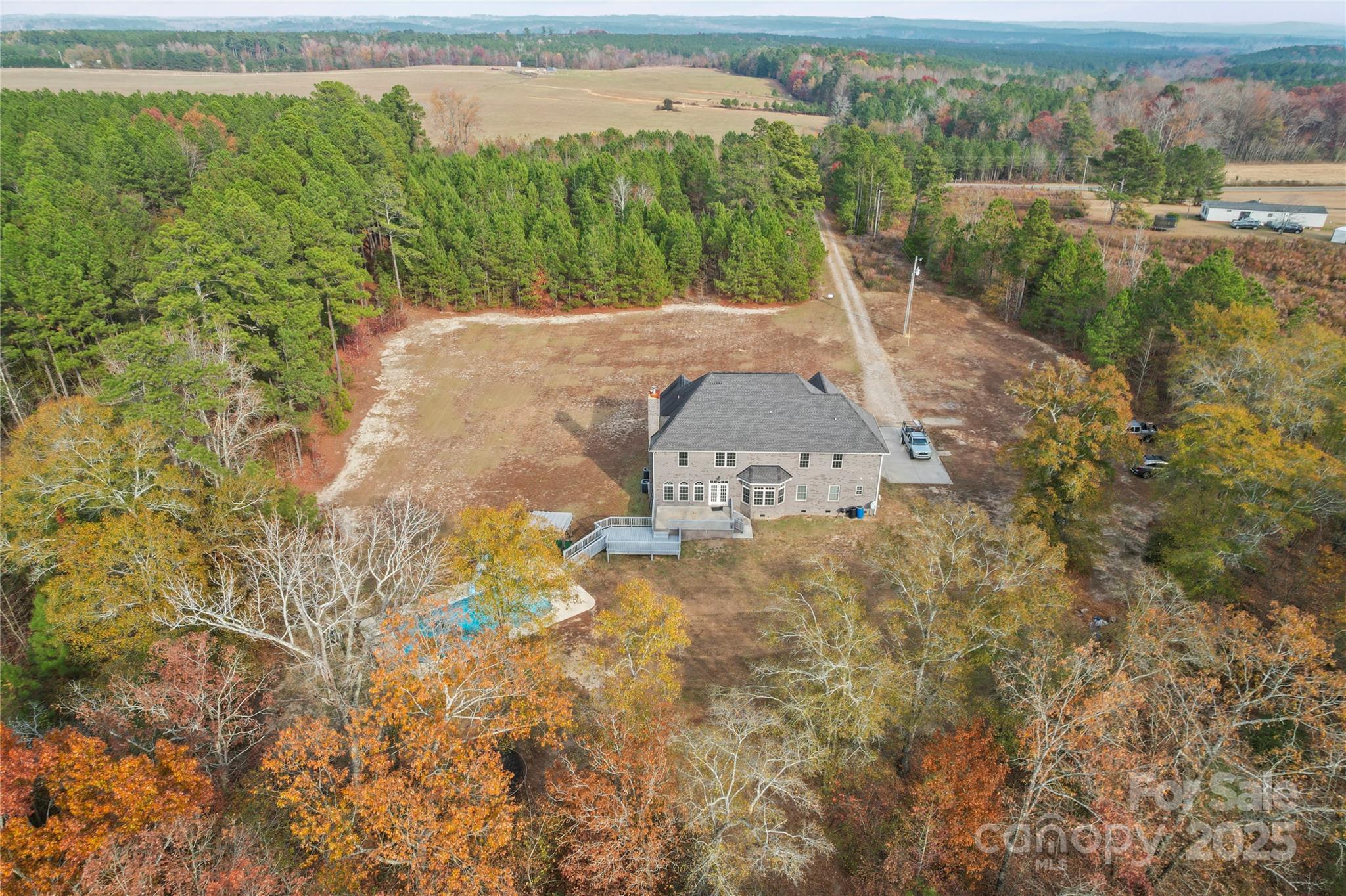 1556 Diggs Road Wadesboro, NC 28170 - Photo 6 of 48 a view of a lake with outdoor space