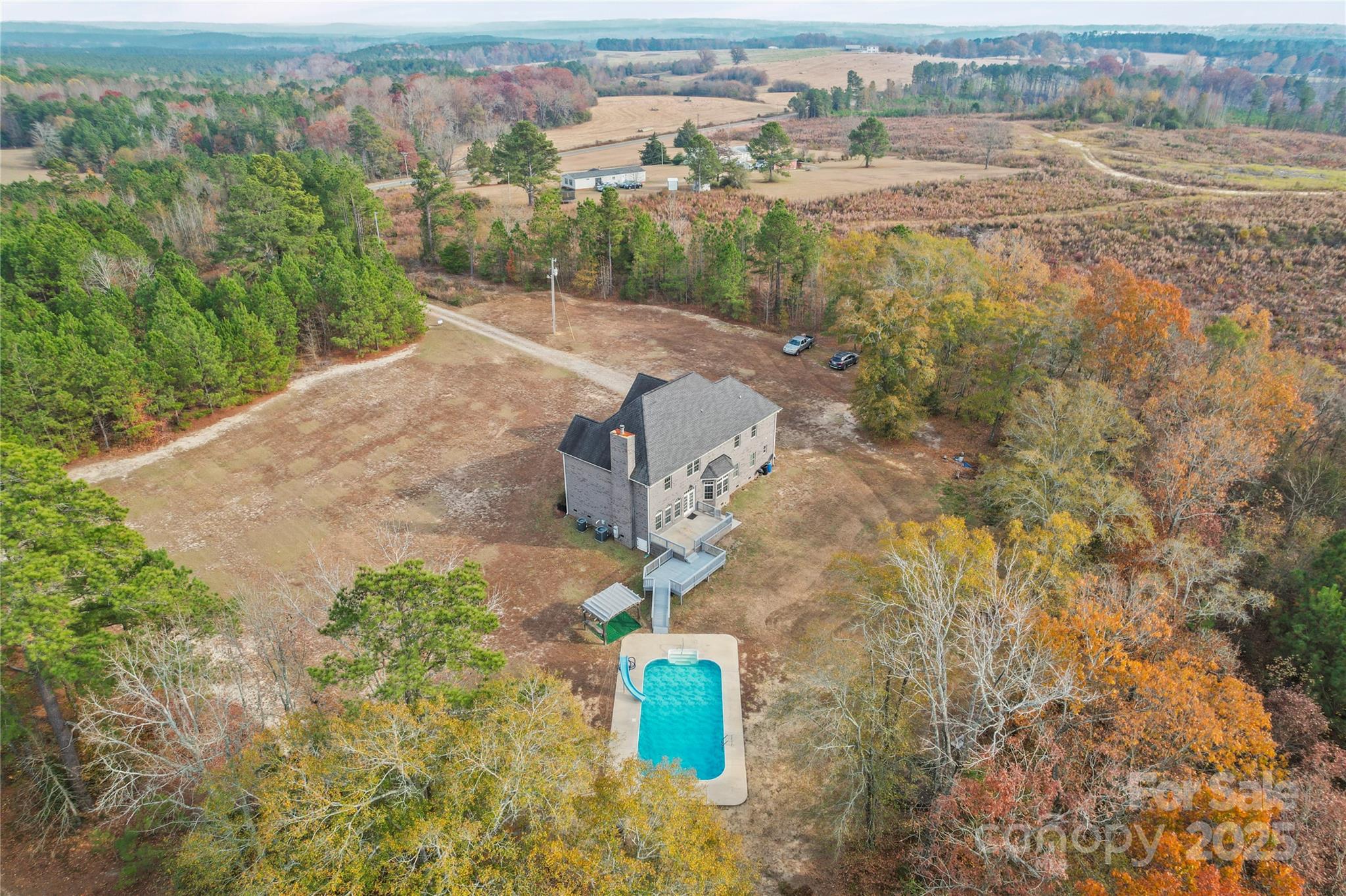 1556 Diggs Road Wadesboro, NC 28170 - Photo 7 of 48 an aerial view of a house with a yard