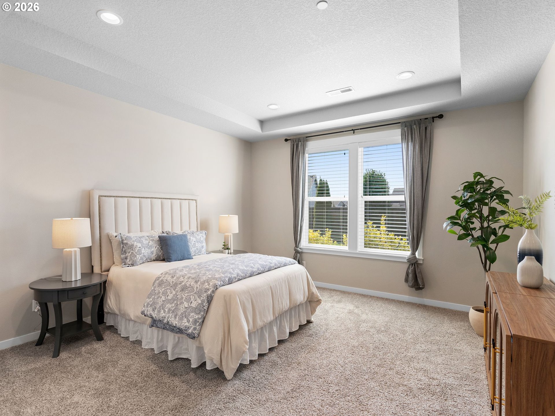3709 Northeast Pioneer Street Camas, WA 98607 - Photo 14 of 30 a bedroom with a bed table and a chair