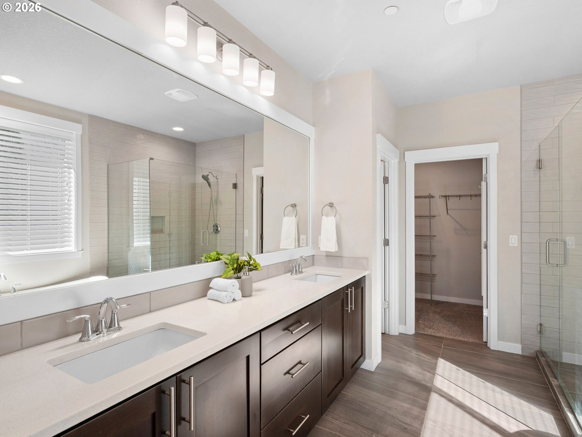 3709 Northeast Pioneer Street Camas, WA 98607 - Photo 17 of 30 a bathroom with a double vanity sink and a mirror
