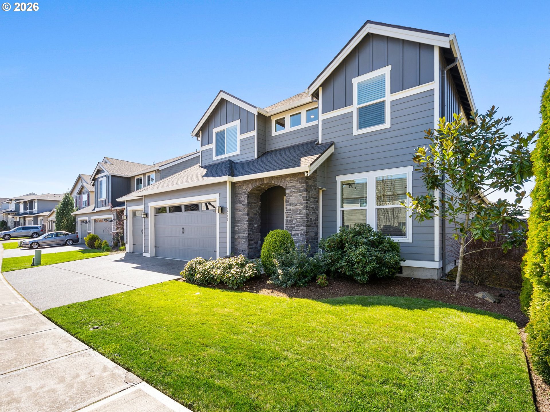 3709 Northeast Pioneer Street Camas, WA 98607 - Photo 2 of 30 a front view of a house with garden