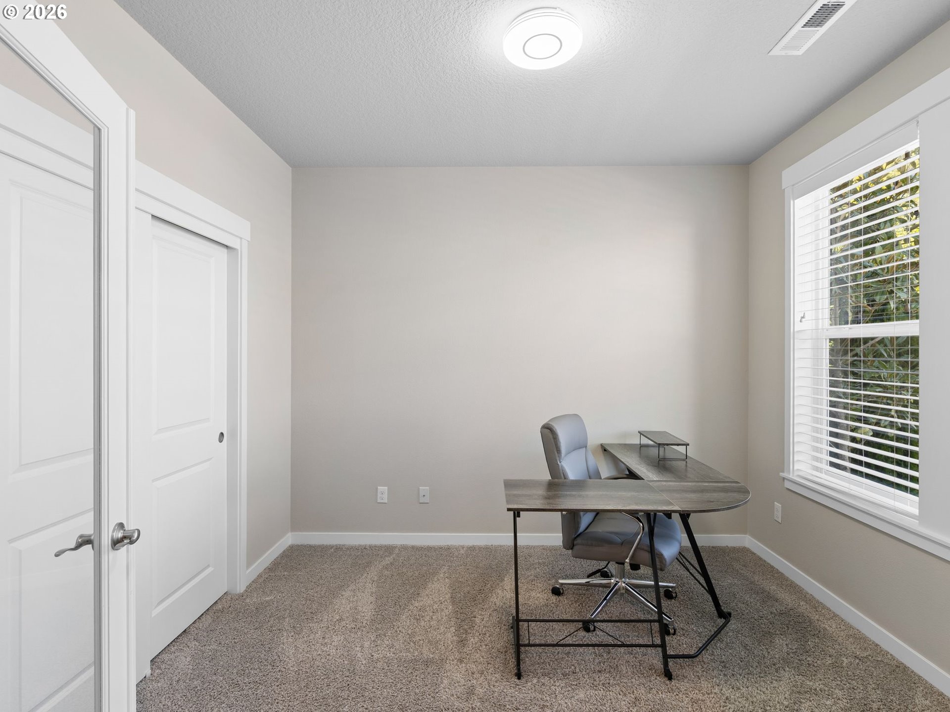 3709 Northeast Pioneer Street Camas, WA 98607 - Photo 4 of 30 a work room with furniture and a window