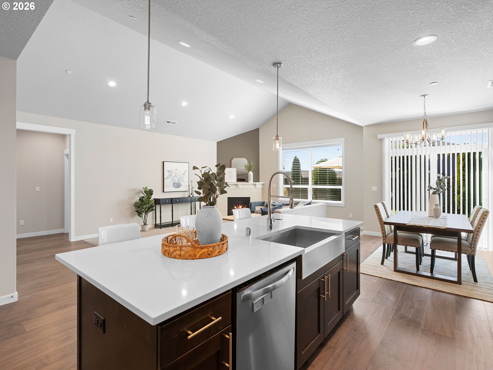 3709 Northeast Pioneer Street Camas, WA 98607 - Photo 9 of 30 a kitchen with stainless steel appliances granite countertop a sink a stove and kitchen island