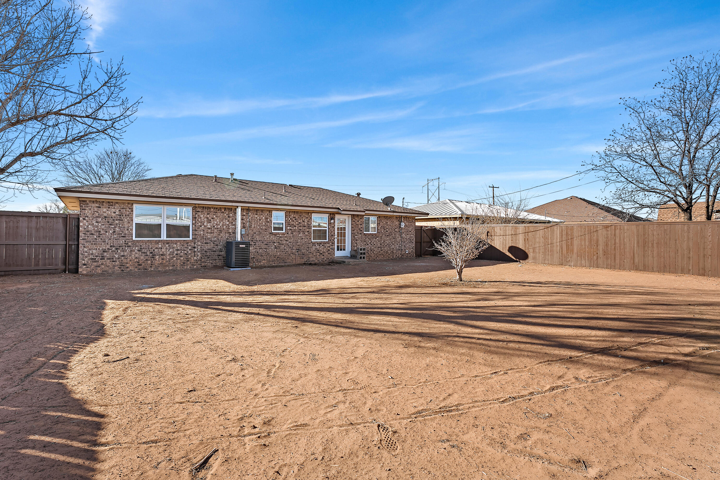 726 11th Street Wolfforth, TX 79382 - Photo 22 of 22 a view of a house with a snow in the yard