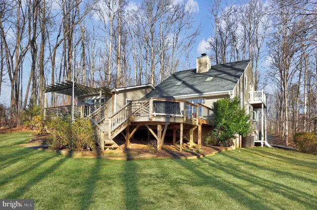 a view of house with outdoor seating space