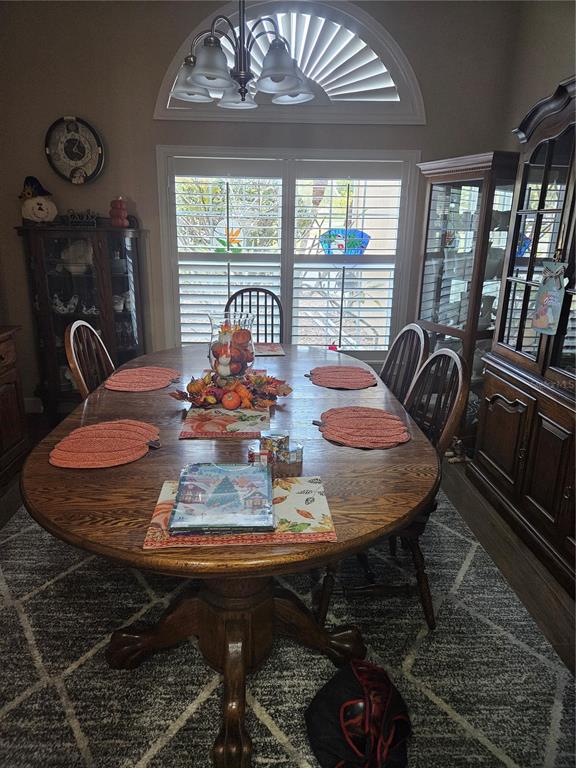 116 Raintree Court Auburndale, FL 33823 - Photo 21 of 45 a view of a dining room with furniture window and outside view