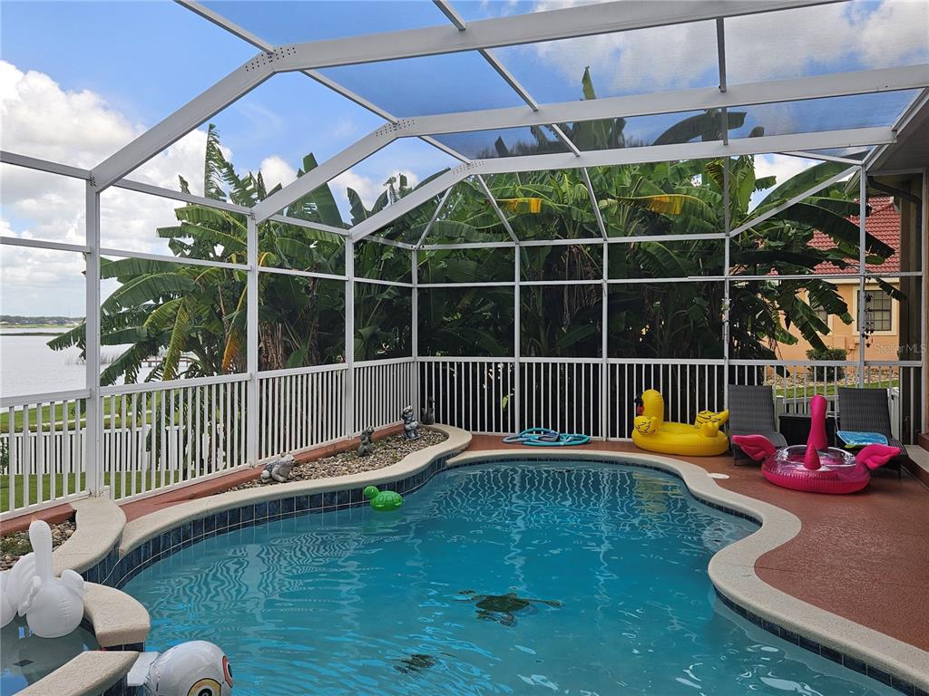 116 Raintree Court Auburndale, FL 33823 - Photo 35 of 45 a view of a chairs and table in the patio