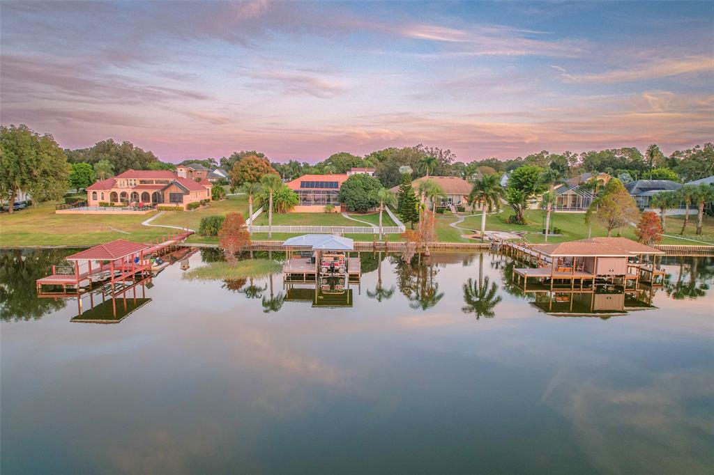 116 Raintree Court Auburndale, FL 33823 - Photo 7 of 45 a view of swimming pool with outdoor seating space and mountain view in back