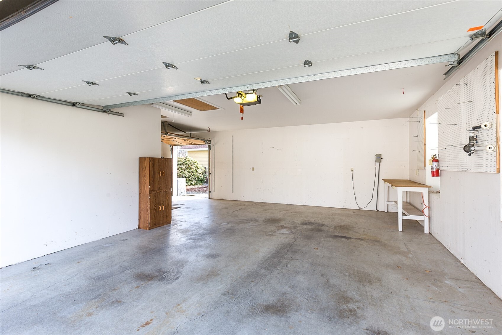 170 Hurricane Ridge Drive Sequim, WA 98382 - Photo 34 of 39 a view of a livingroom with wooden floor and white walls