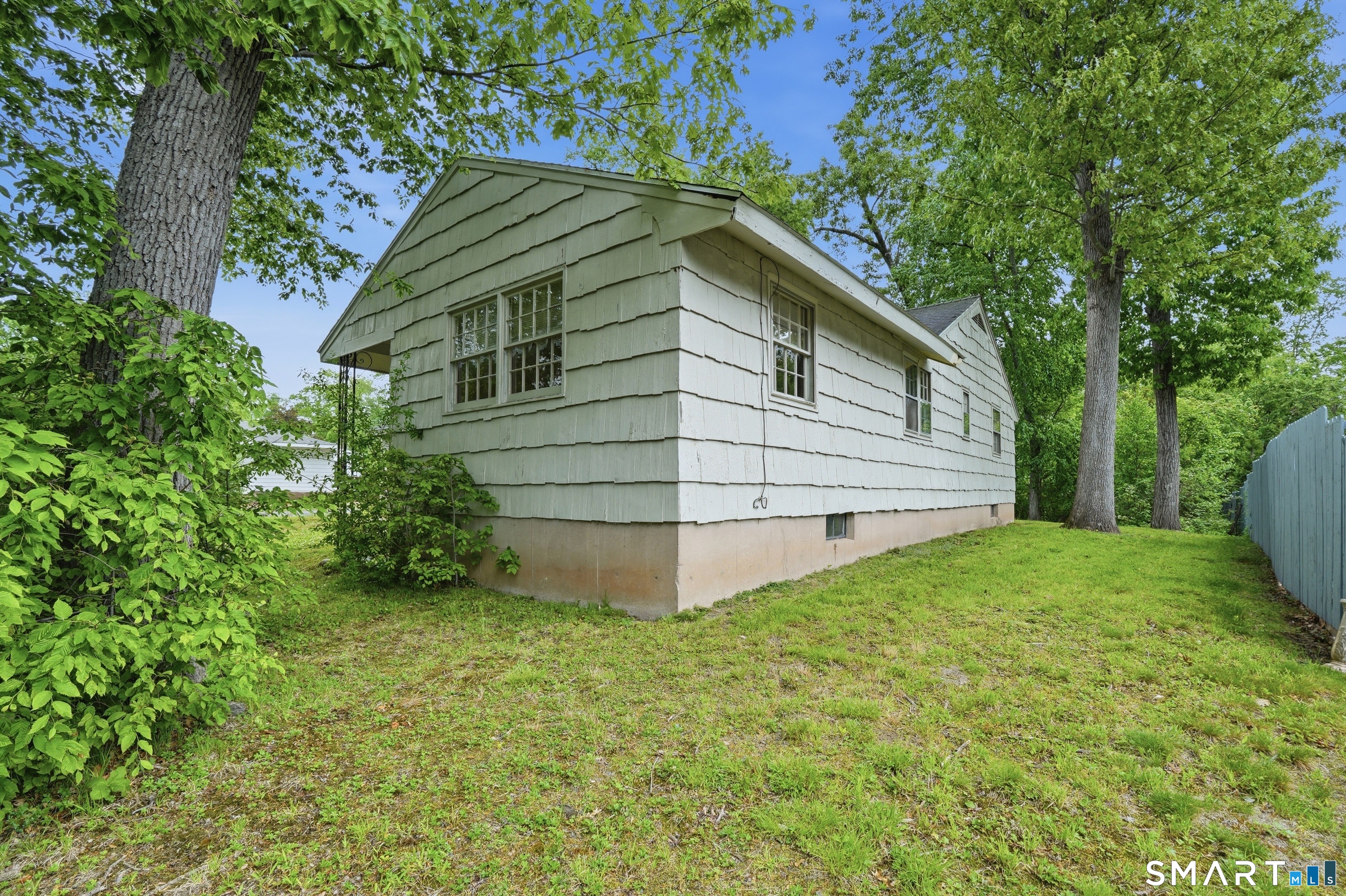 731 Still Hill Road Hamden, CT 06518 - Photo 39 of 40 a view of a house with a yard