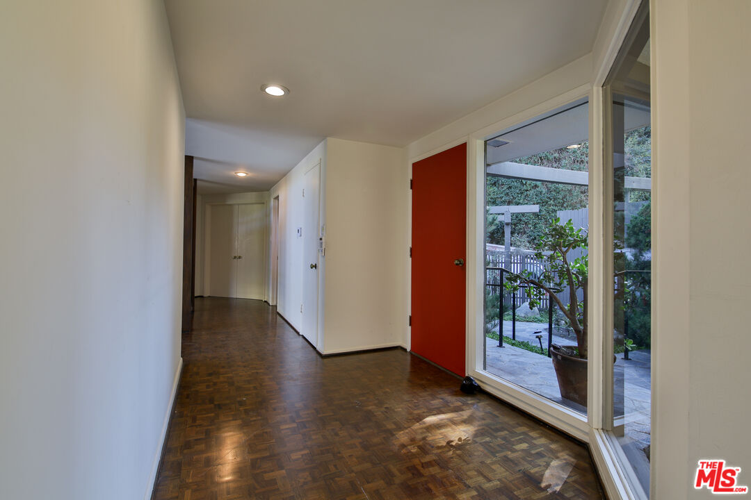 1749 Mandeville Lane Los Angeles, CA 90049 - Photo 2 of 38 a view of entryway with wooden floor