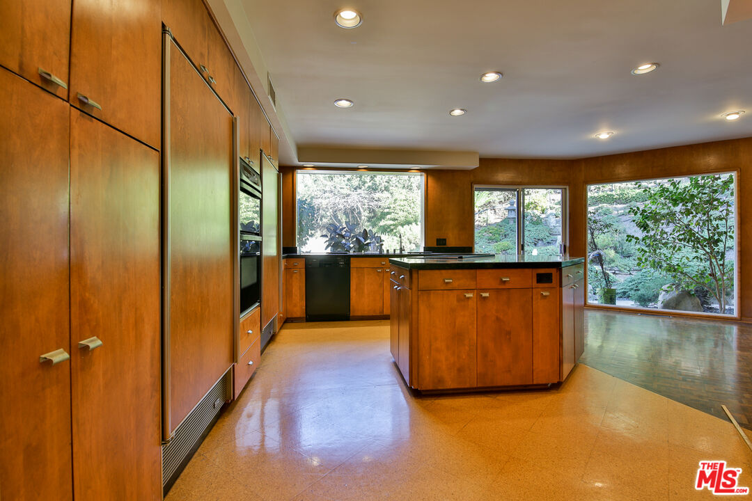 1749 Mandeville Lane Los Angeles, CA 90049 - Photo 6 of 38 a view of a kitchen with a large window