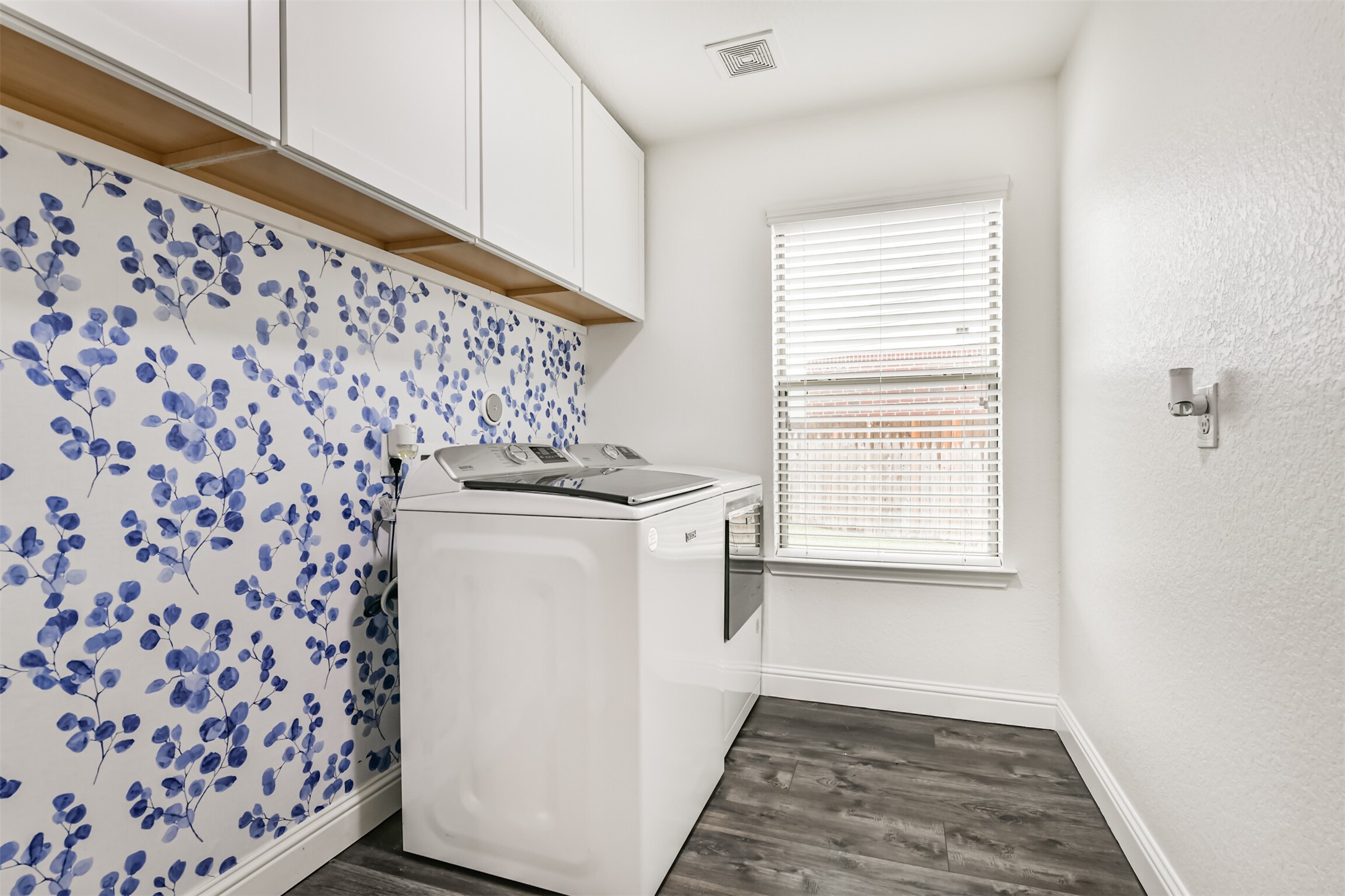 1607 Jaquima Valley Way Houston, TX 77049 - Photo 15 of 26 Laundry room downstairs & added cabinets