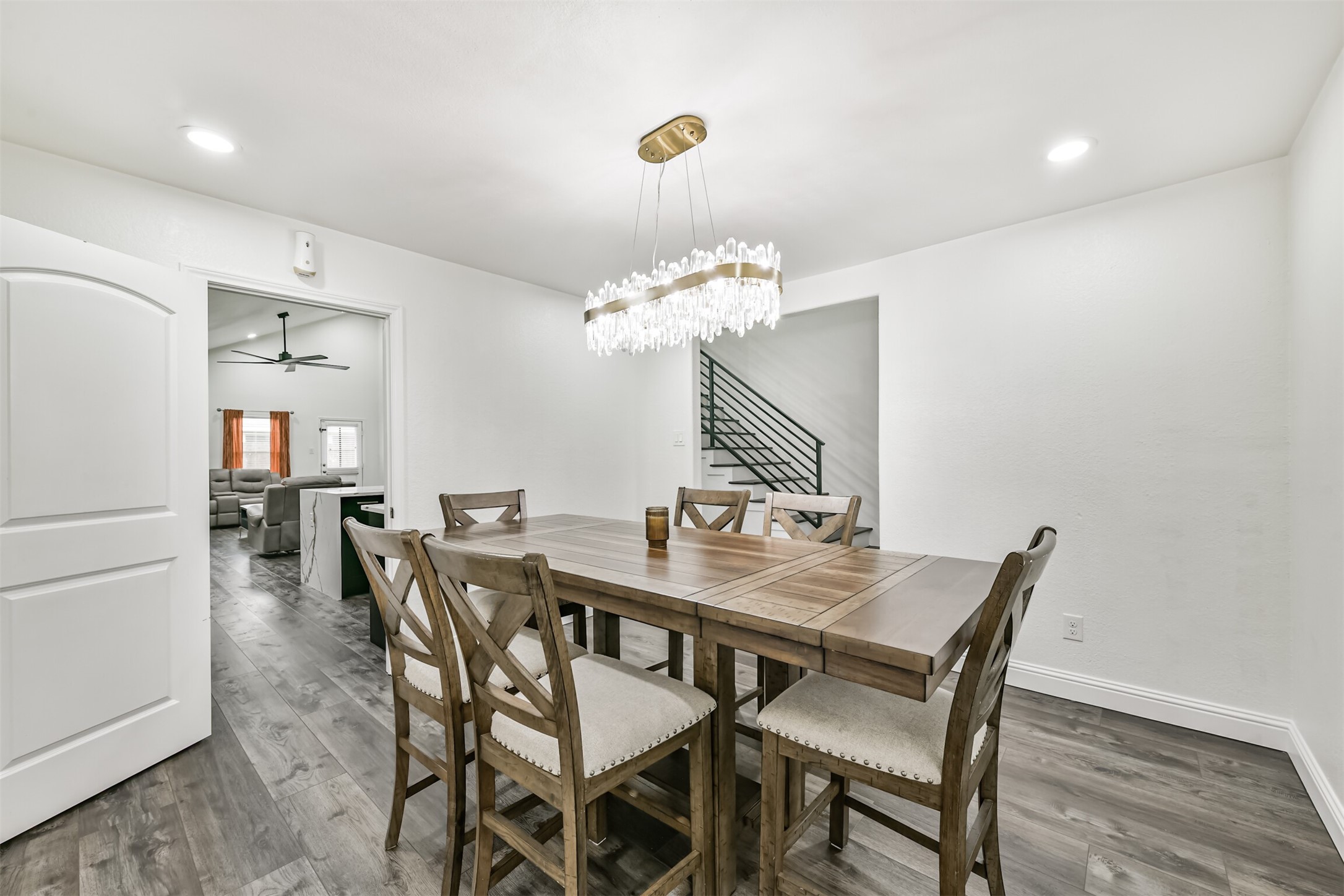 1607 Jaquima Valley Way Houston, TX 77049 - Photo 4 of 26 Centerpiece light fixture elevates your dining experience