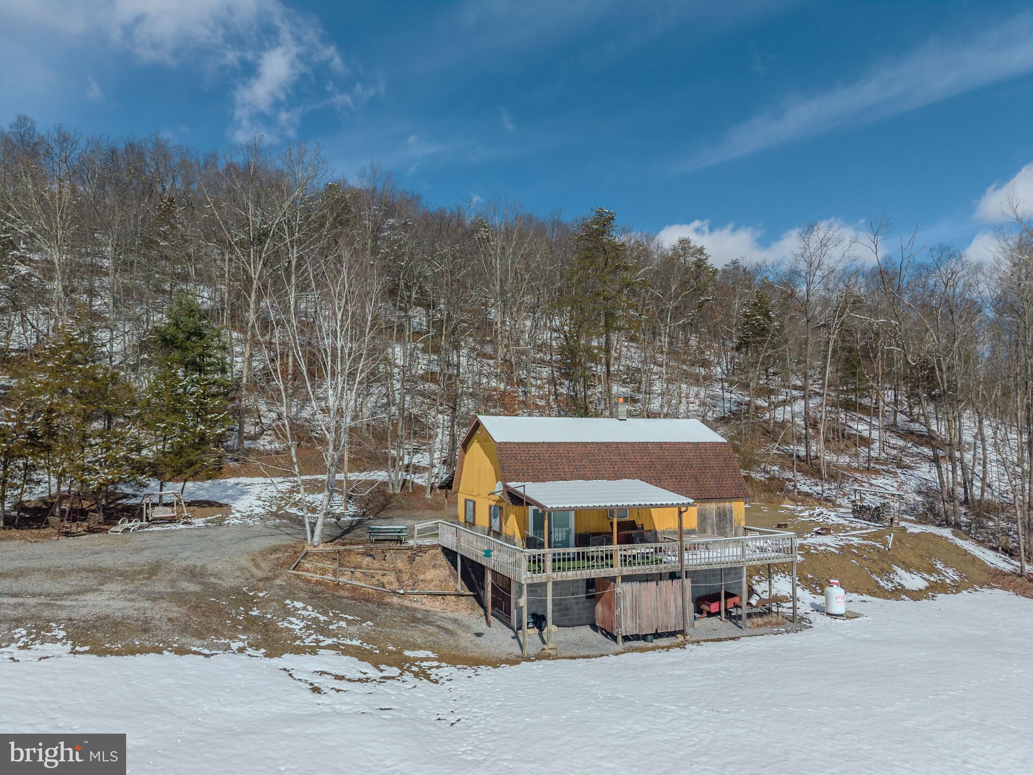 21697 View Drive Three Springs, PA 17264 - Photo 25 of 66 Charming cabin nestled in snowy serenity.