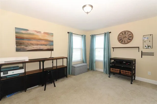 a view of a livingroom with furniture