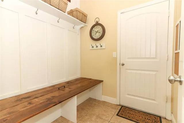 a view of a storage and utility room with cabinet