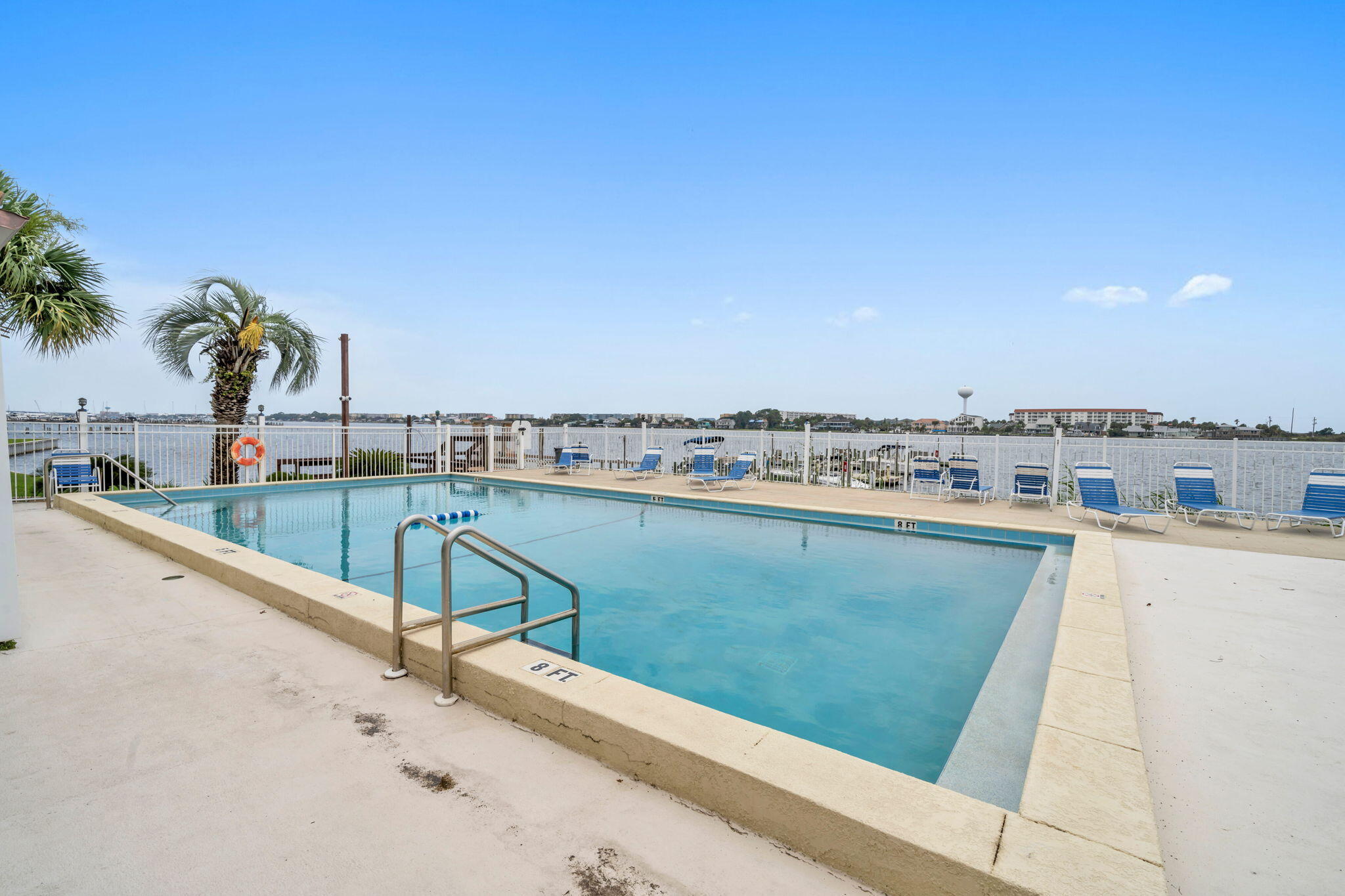 308 Miracle Strip Parkway Southwest, Unit 1B Fort Walton Beach, FL 32548 - Photo 25 of 42 a view of a swimming pool and an outdoor seating