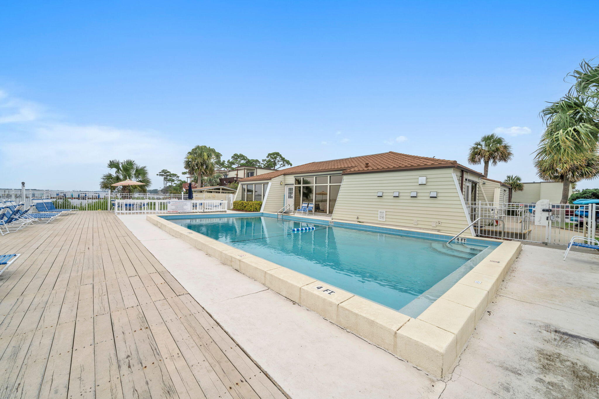308 Miracle Strip Parkway Southwest, Unit 1B Fort Walton Beach, FL 32548 - Photo 29 of 42 a view of swimming pool with a yard