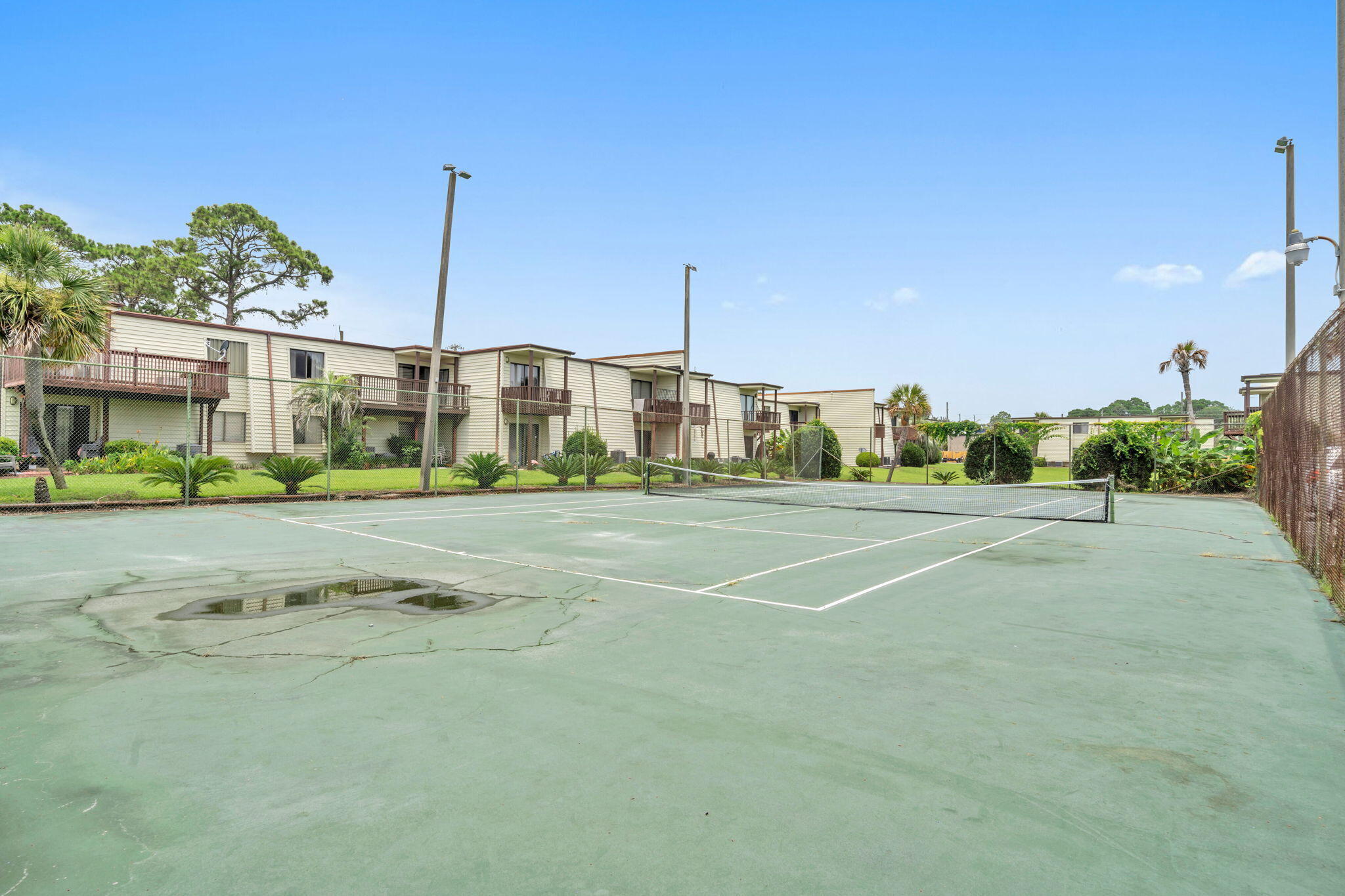 308 Miracle Strip Parkway Southwest, Unit 1B Fort Walton Beach, FL 32548 - Photo 30 of 42 a view of a basket ball ground