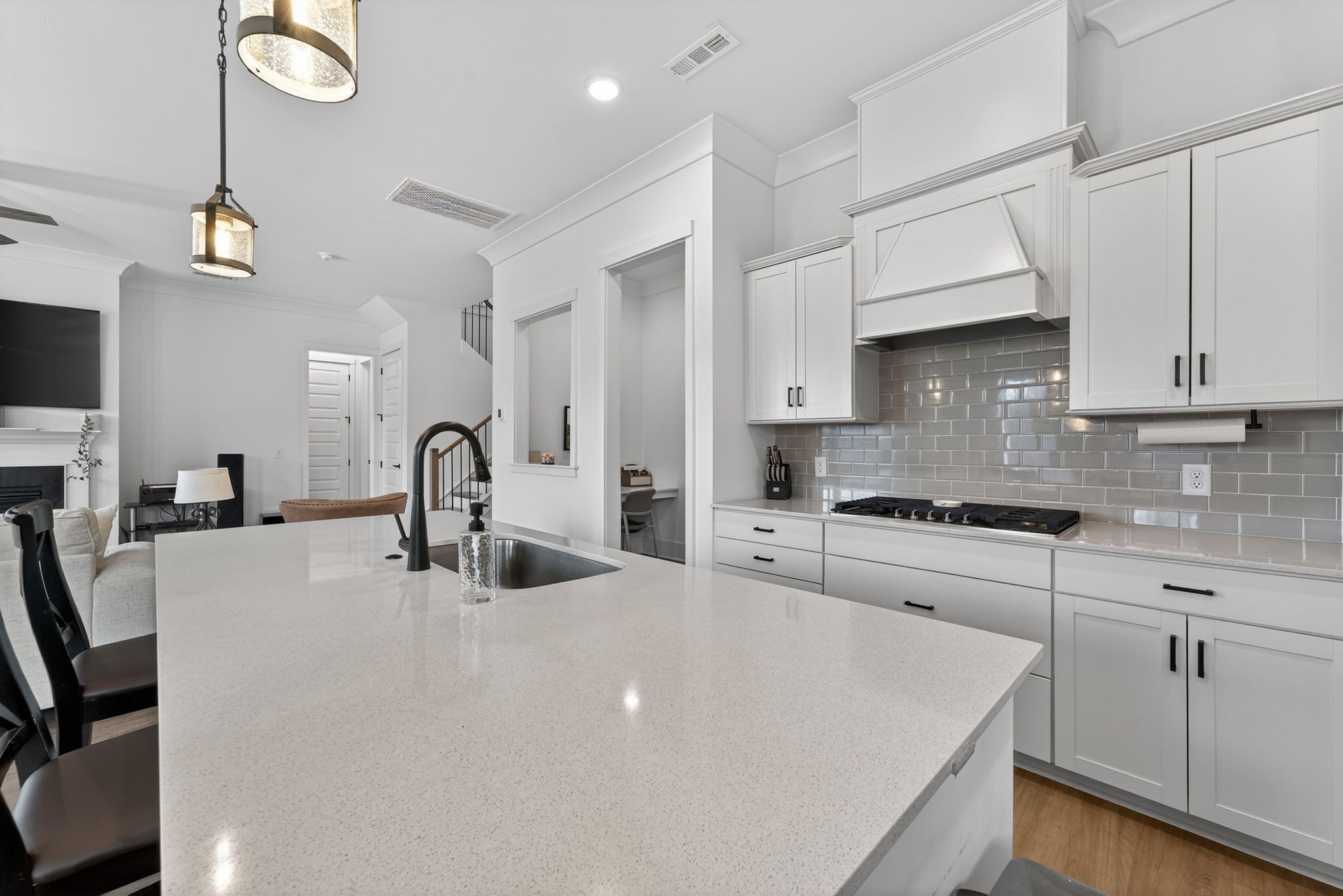 7780 Second Fiddle Way Arrington, TN 37014 - Photo 12 of 37 a kitchen with stainless steel appliances granite countertop a sink a stove and a refrigerator