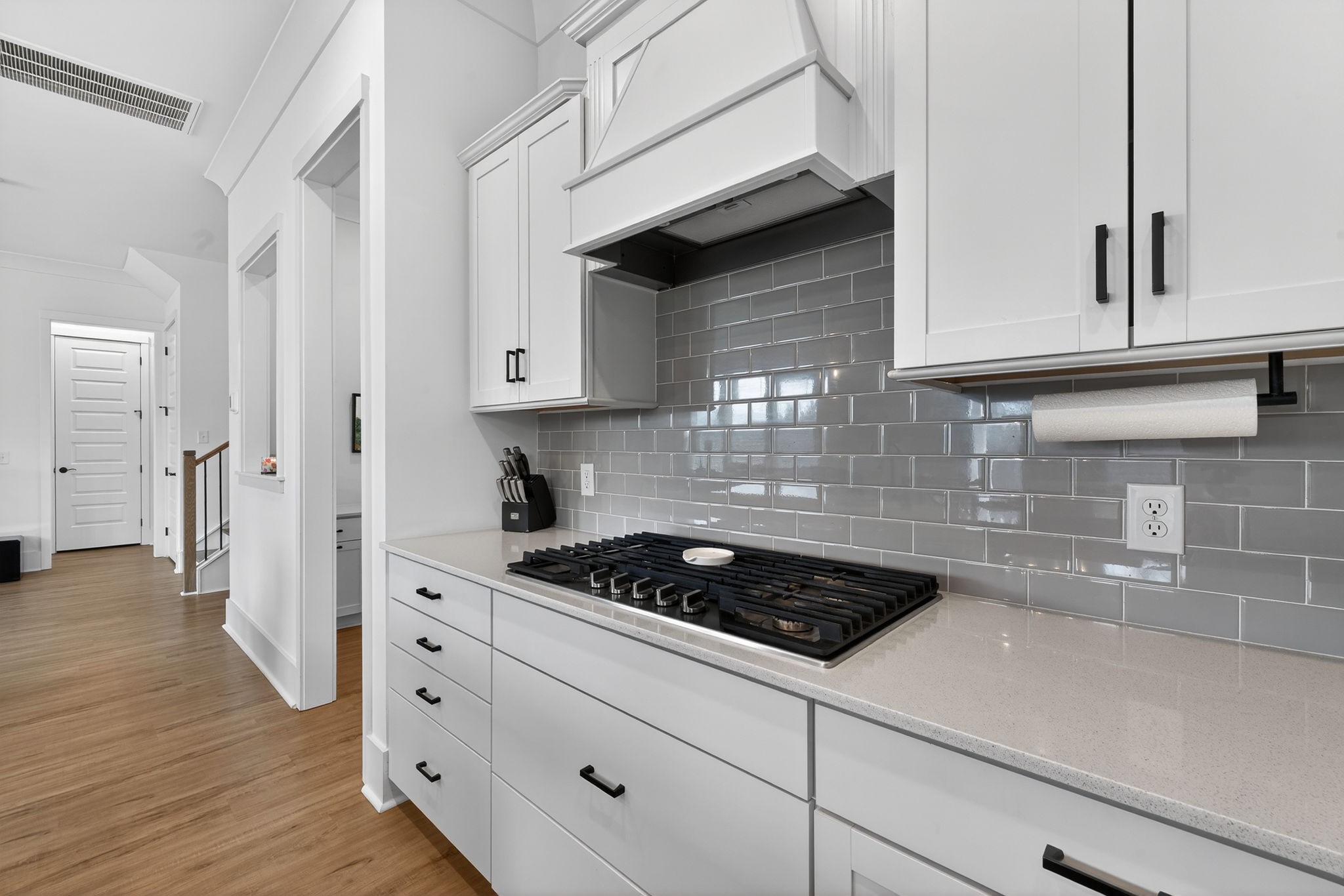 7780 Second Fiddle Way Arrington, TN 37014 - Photo 13 of 37 a kitchen with granite countertop white cabinets and white appliances