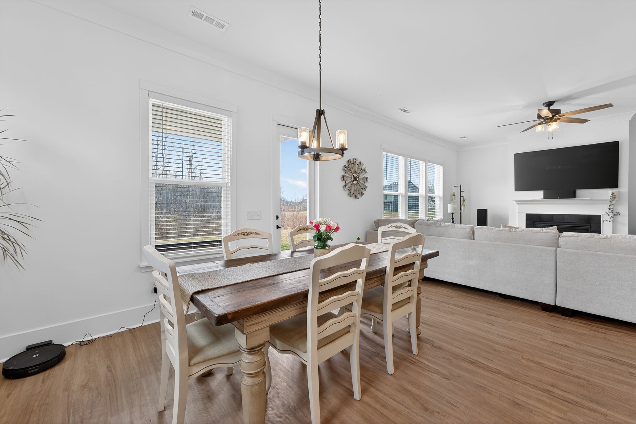 7780 Second Fiddle Way Arrington, TN 37014 - Photo 14 of 37 a view of a dining room with furniture window and wooden floor