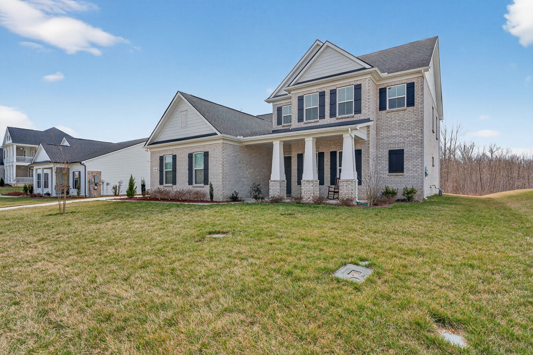 7780 Second Fiddle Way Arrington, TN 37014 - Photo 2 of 37 a front view of a house with garden