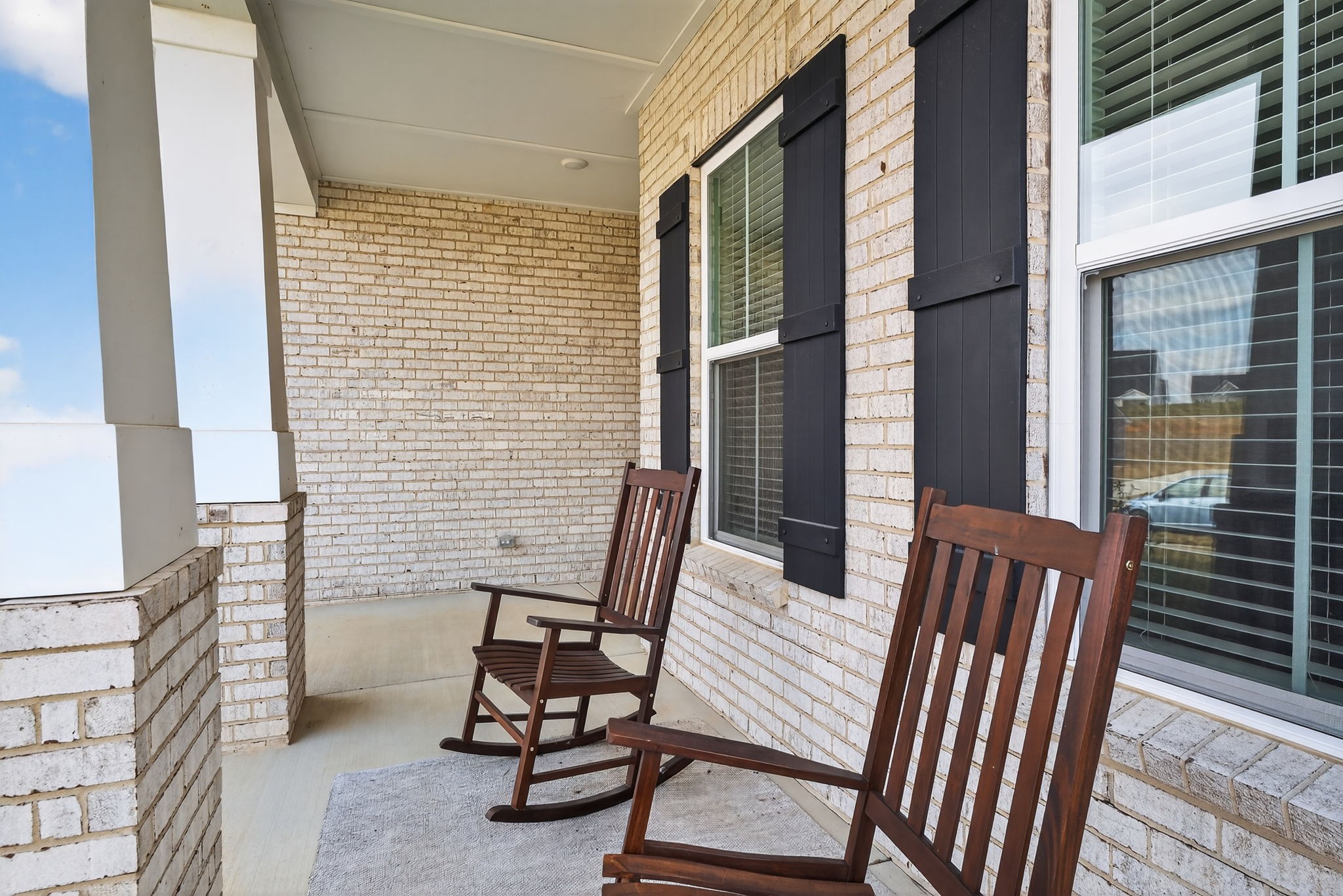 7780 Second Fiddle Way Arrington, TN 37014 - Photo 4 of 37 a view of a chair and tables in the balcony