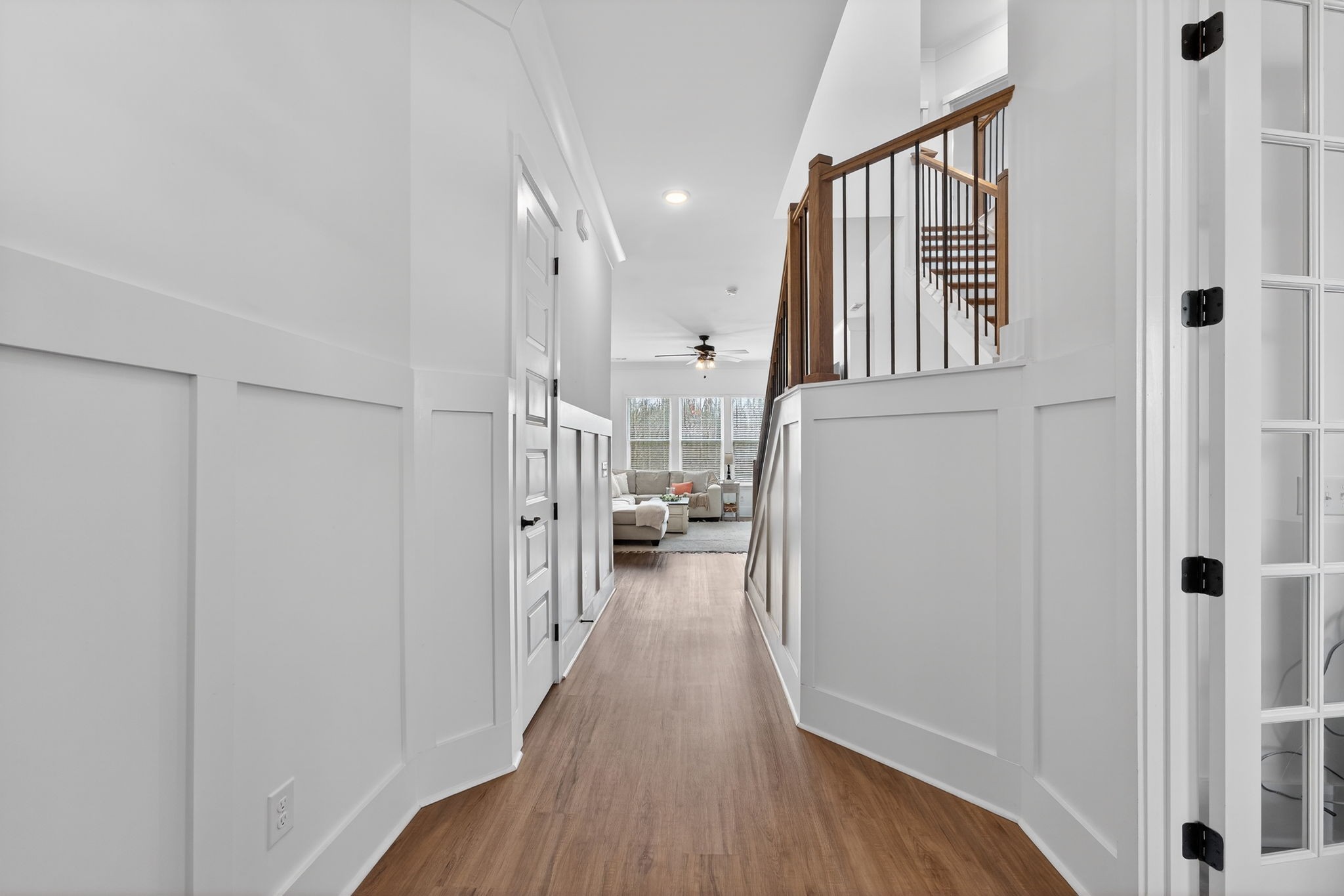 7780 Second Fiddle Way Arrington, TN 37014 - Photo 5 of 37 a view of a hallway with wooden floor and staircase
