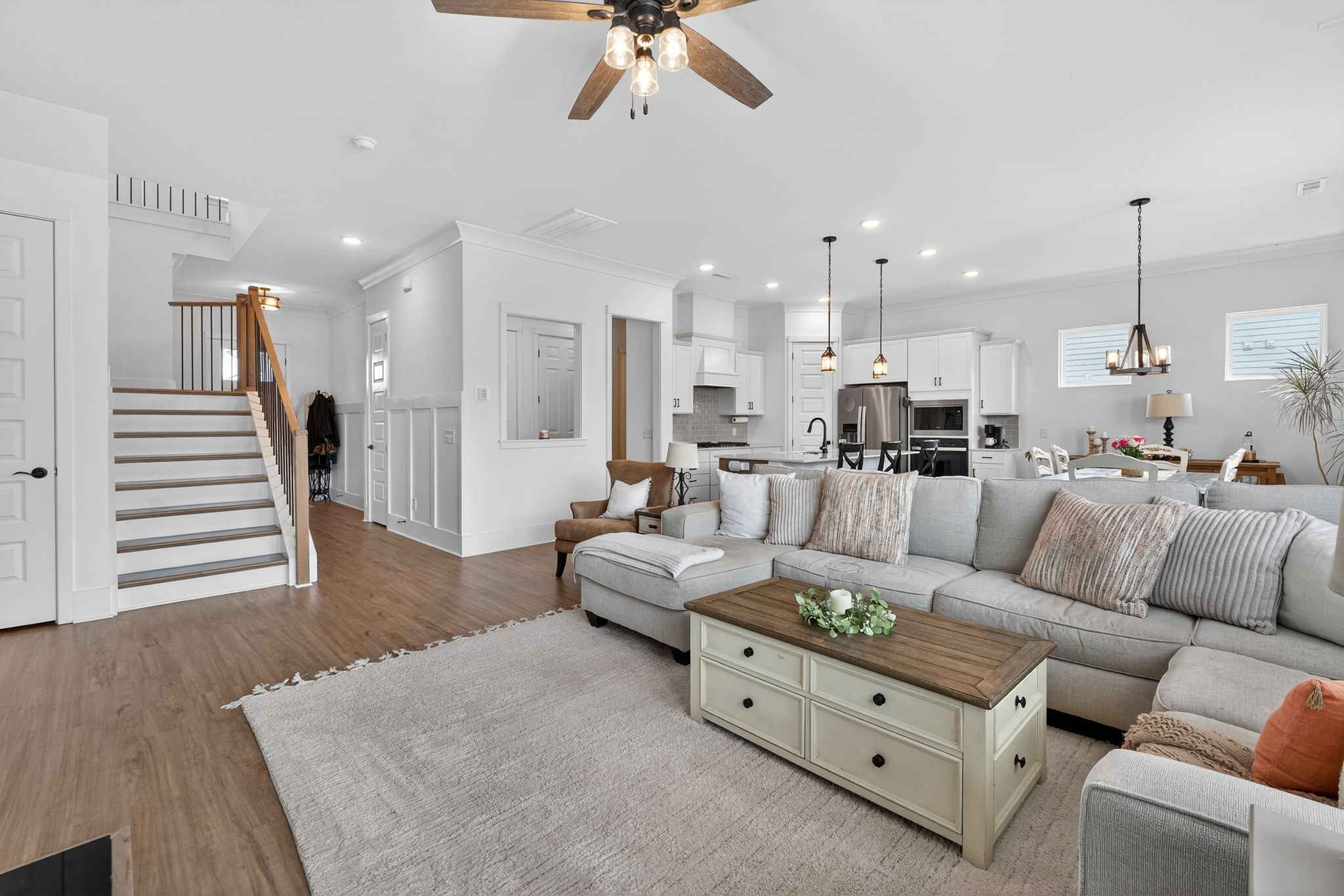 7780 Second Fiddle Way Arrington, TN 37014 - Photo 9 of 37 a living room with furniture kitchen view and a chandelier