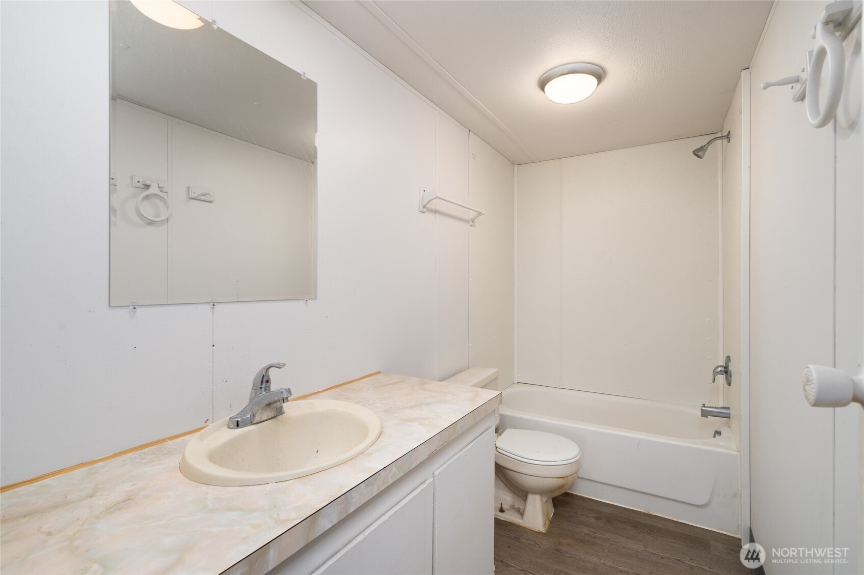 1133 State Street Sedro-Woolley, WA 98284 - Photo 11 of 28 a bathroom with a granite countertop sink toilet and shower