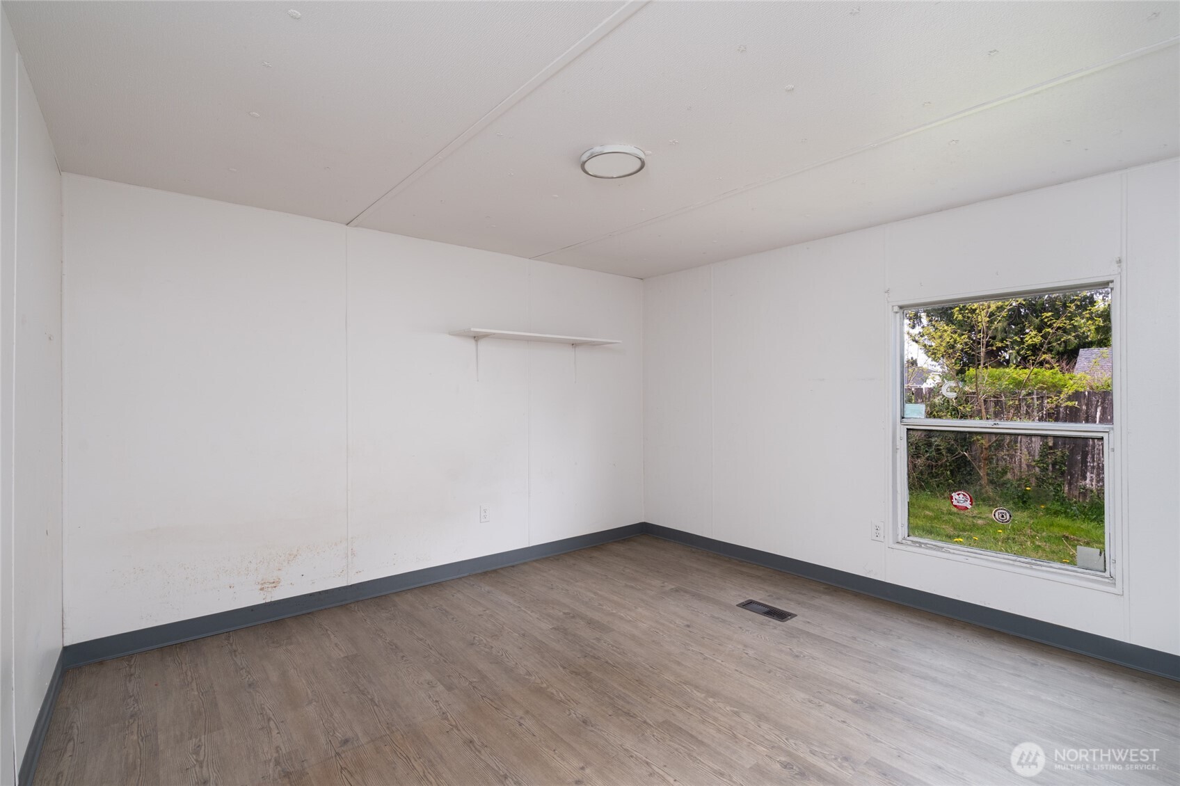 1133 State Street Sedro-Woolley, WA 98284 - Photo 12 of 28 a view of an empty room with a window