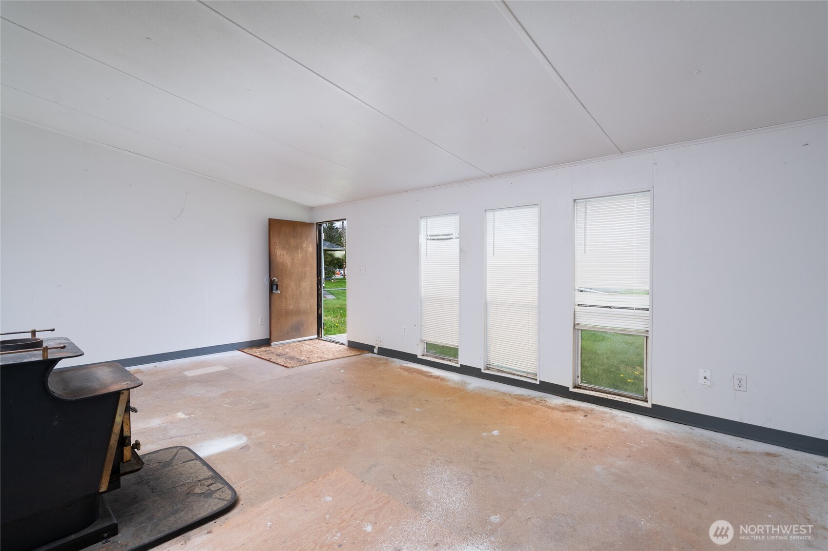 1133 State Street Sedro-Woolley, WA 98284 - Photo 6 of 28 a view of an empty room with a window