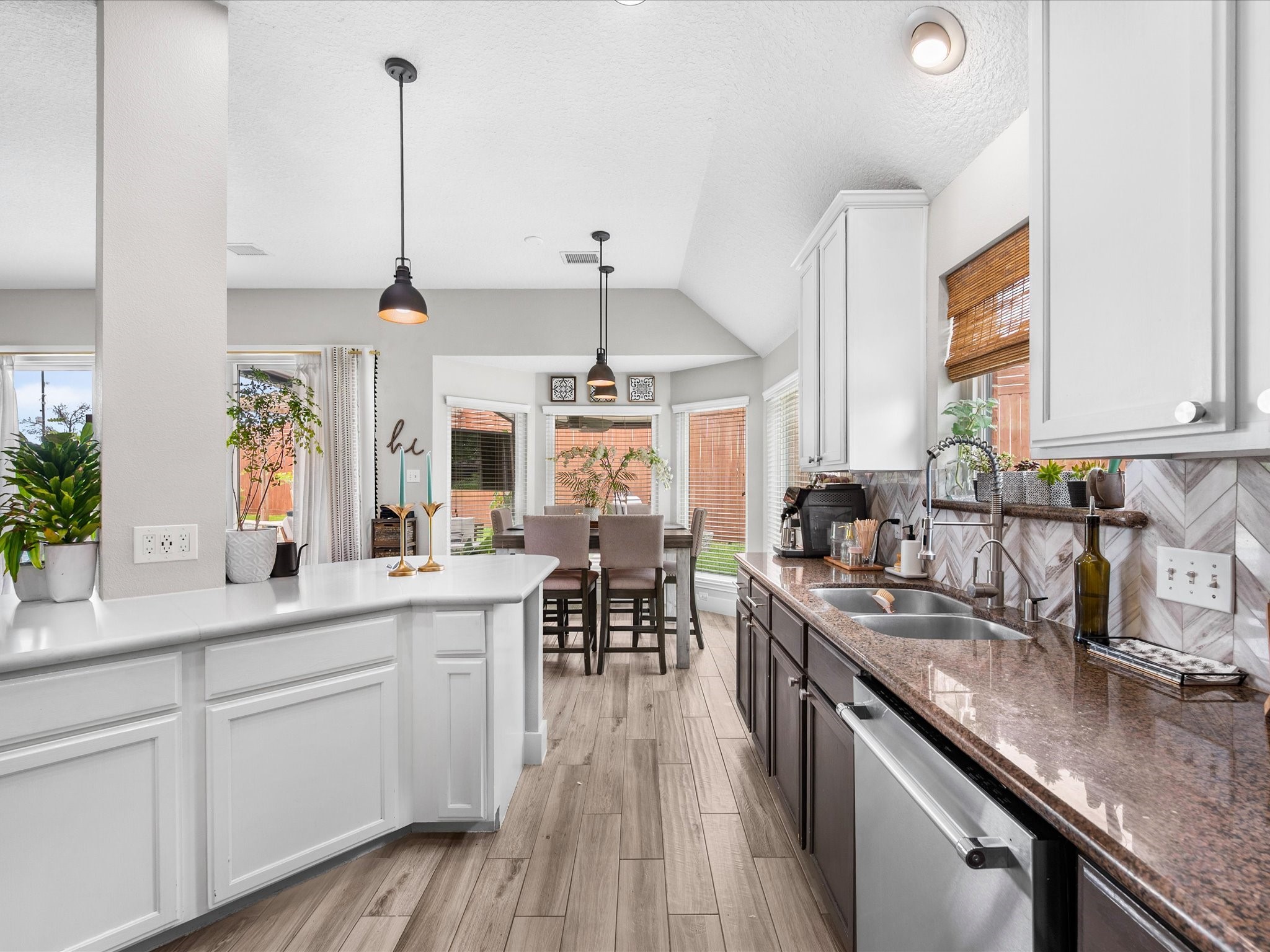 4023 Tigris Ridge Drive Katy, TX 77449 - Photo 15 of 39 A bright breakfast nook surrounded by large windows overlooks the backyard and fills the space with natural light.