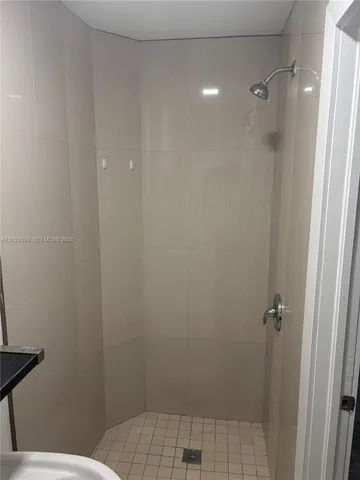 a bathroom with a sink and toilet