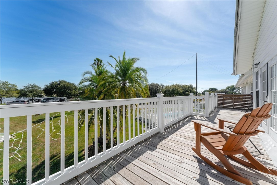300 1st Street Moore Haven, FL 33471 - Photo 15 of 45 a view of a balcony with chairs