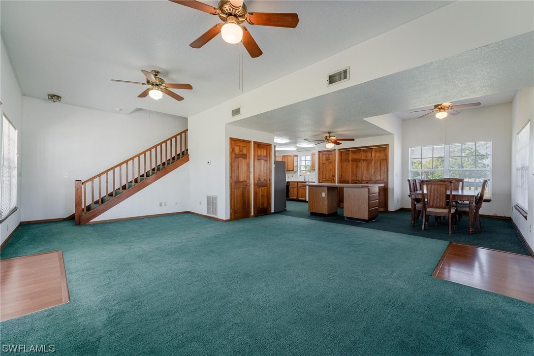 300 1st Street Moore Haven, FL 33471 - Photo 26 of 45 a living room with furniture and a window