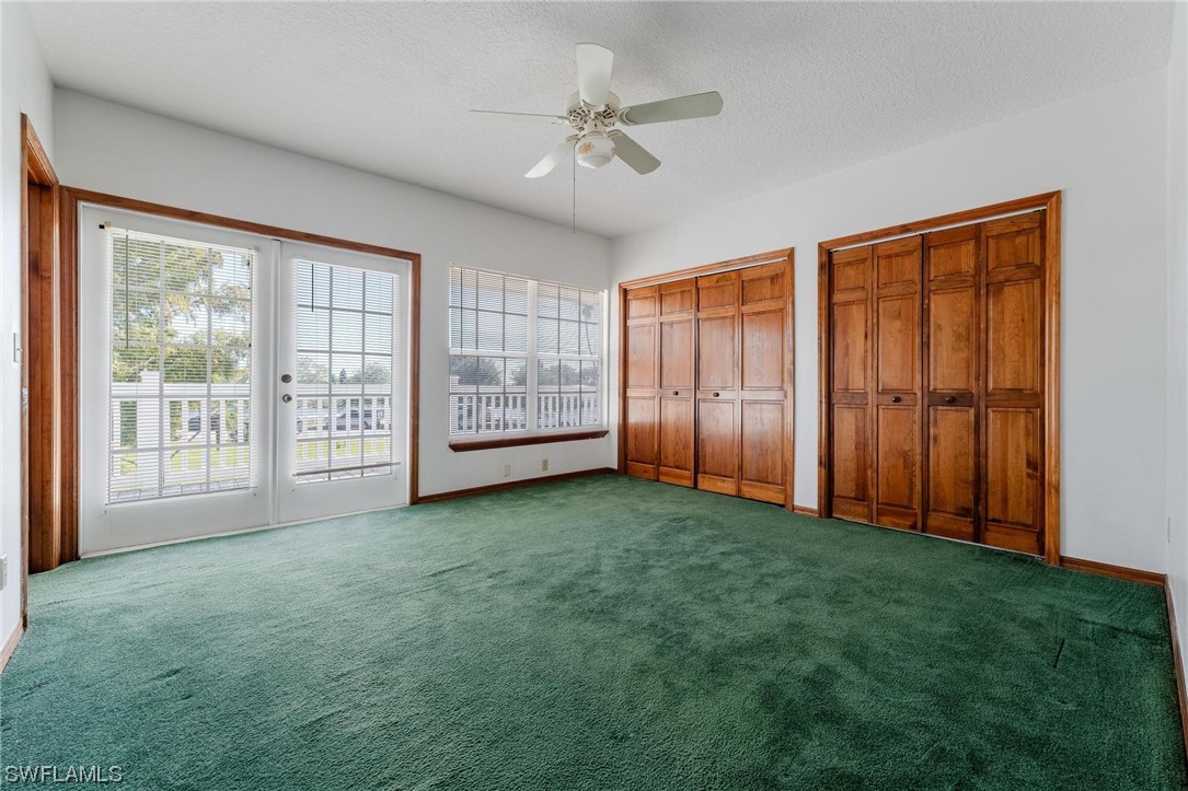 300 1st Street Moore Haven, FL 33471 - Photo 27 of 45 an empty room with windows and closet