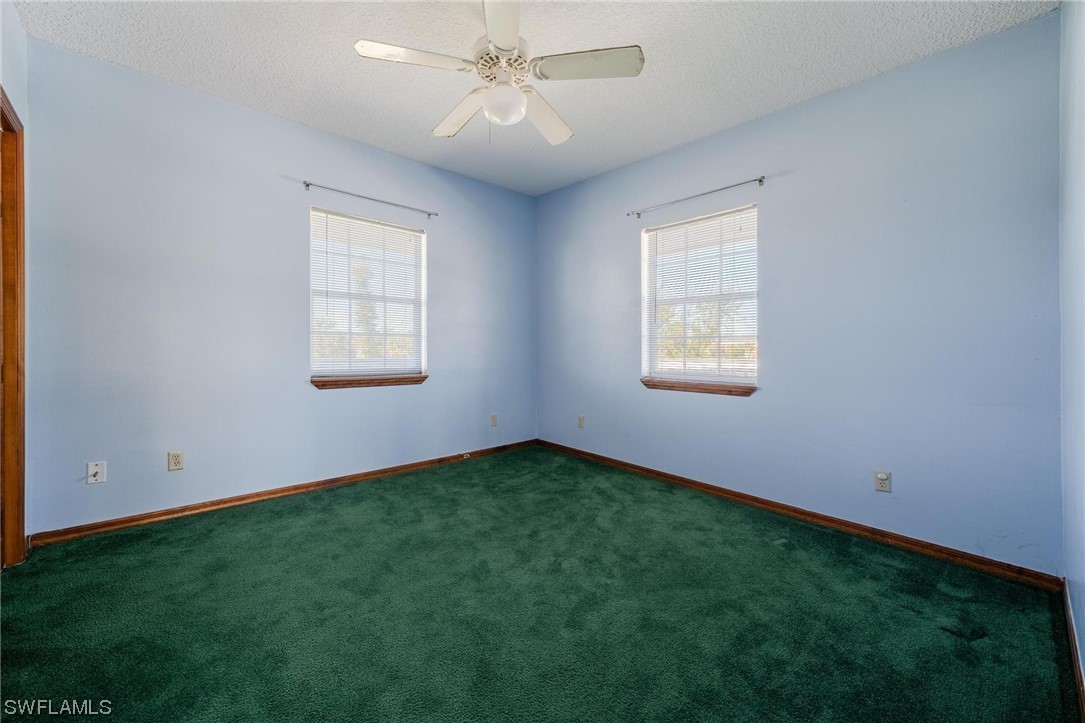 300 1st Street Moore Haven, FL 33471 - Photo 28 of 45 a view of an empty room with a window