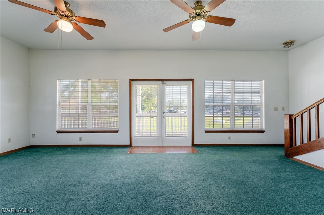 300 1st Street Moore Haven, FL 33471 - Photo 30 of 45 a view of an empty room with a window and a kitchen