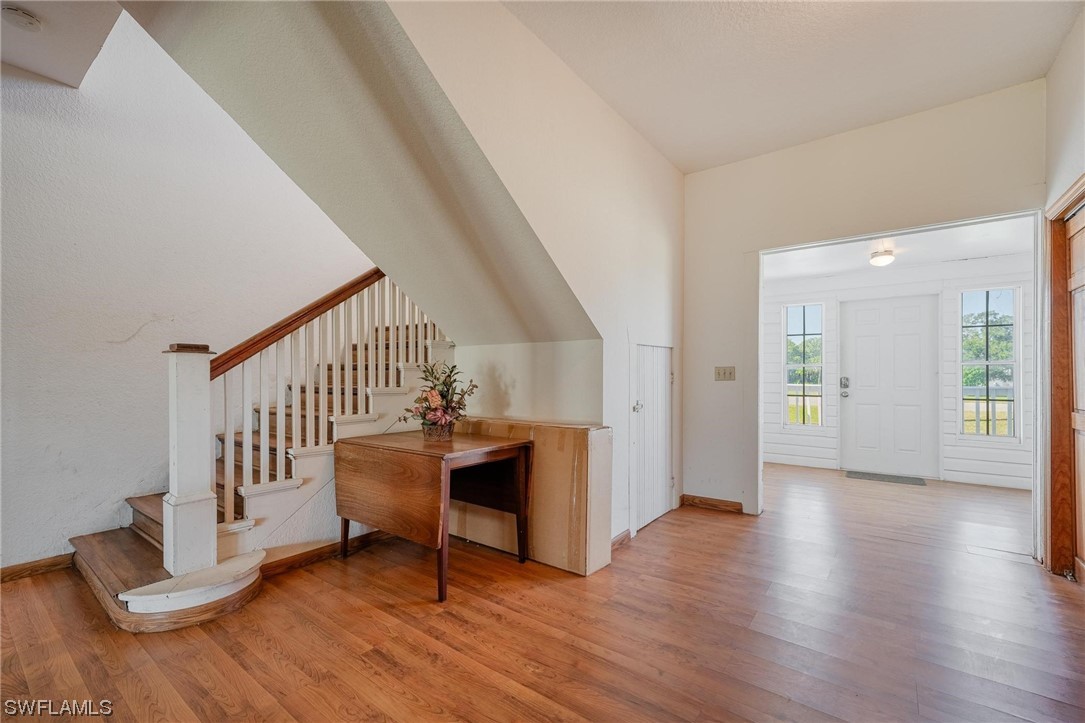 300 1st Street Moore Haven, FL 33471 - Photo 33 of 45 a view of a livingroom with wooden floor and furniture