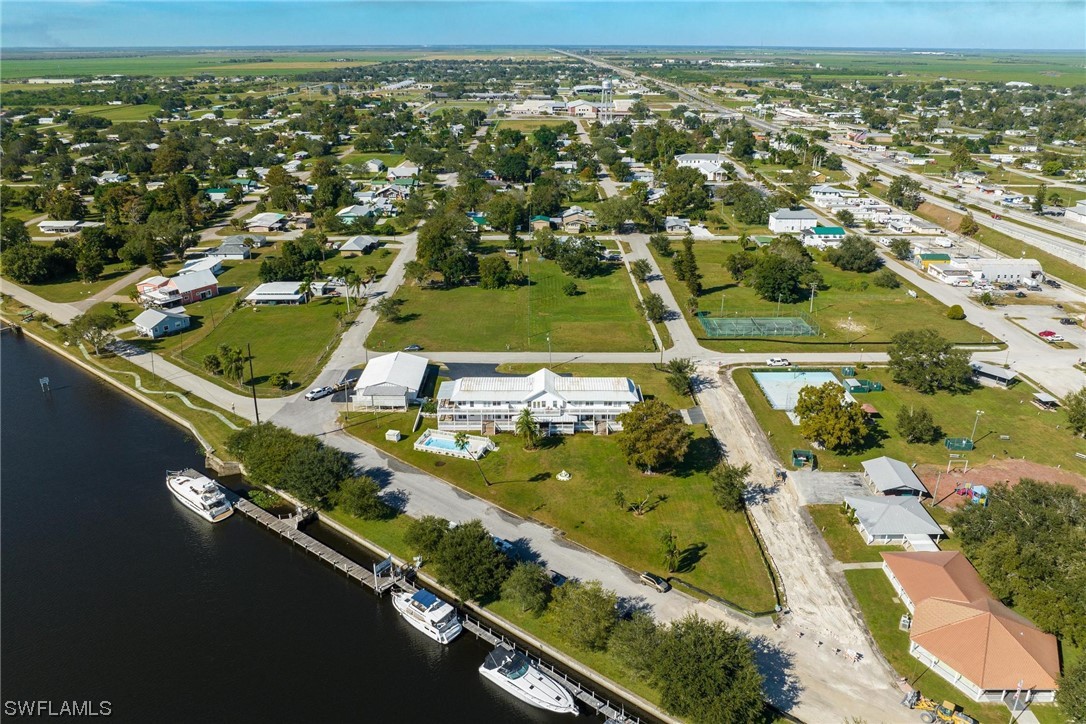 300 1st Street Moore Haven, FL 33471 - Photo 39 of 45 an aerial view of residential houses with outdoor space