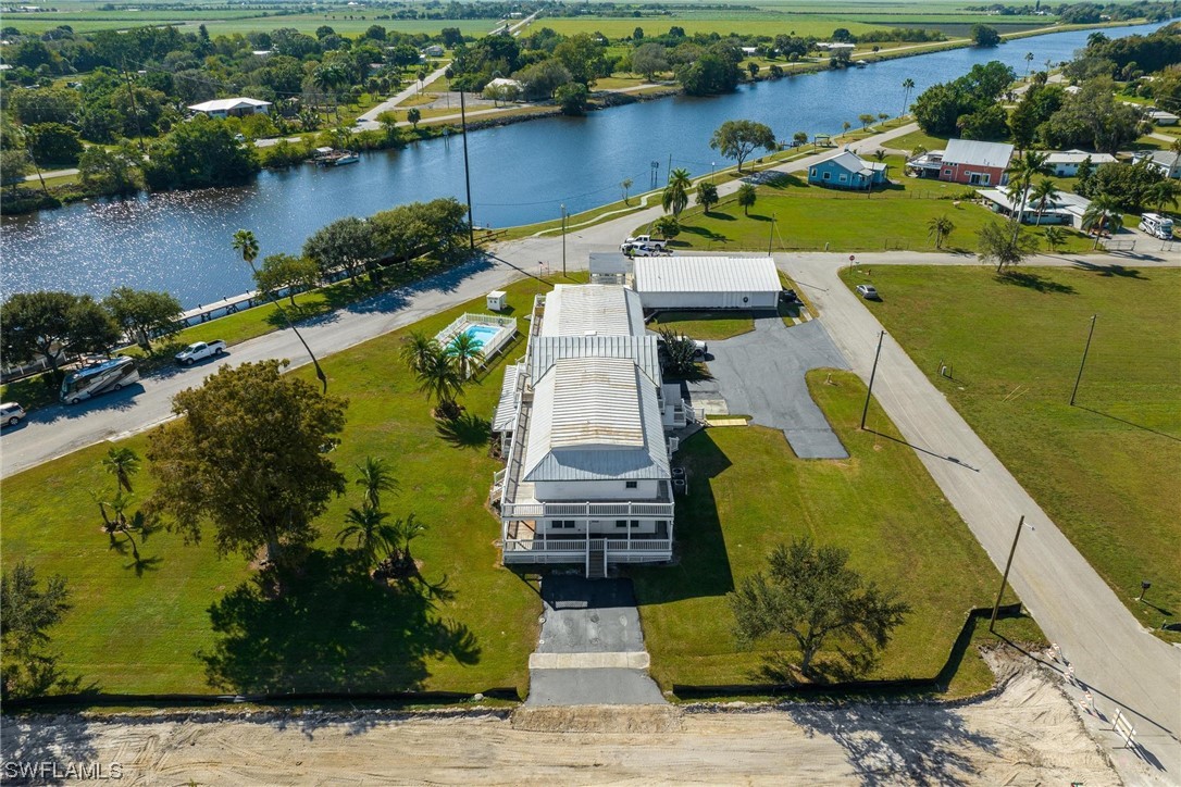 300 1st Street Moore Haven, FL 33471 - Photo 42 of 45 an aerial view of a house with outdoor space